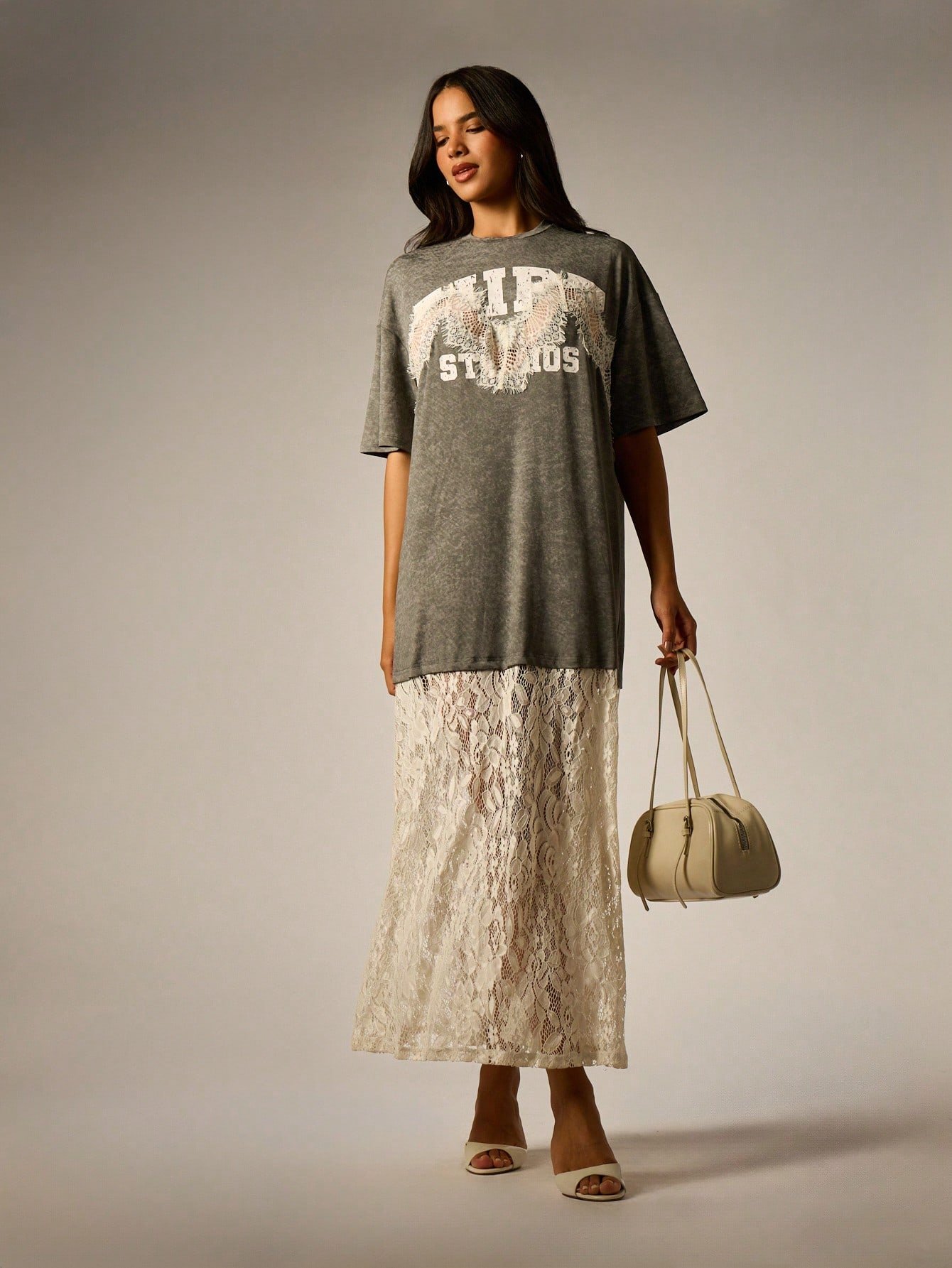 Oversized acid wash tee with lace angel wings