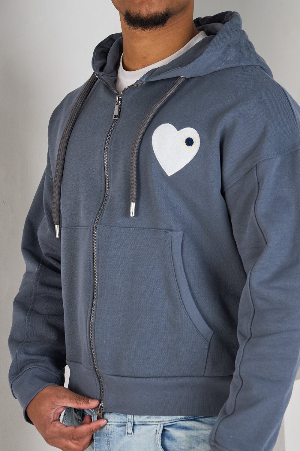 Grey zip-up hoodie with embroidered heart