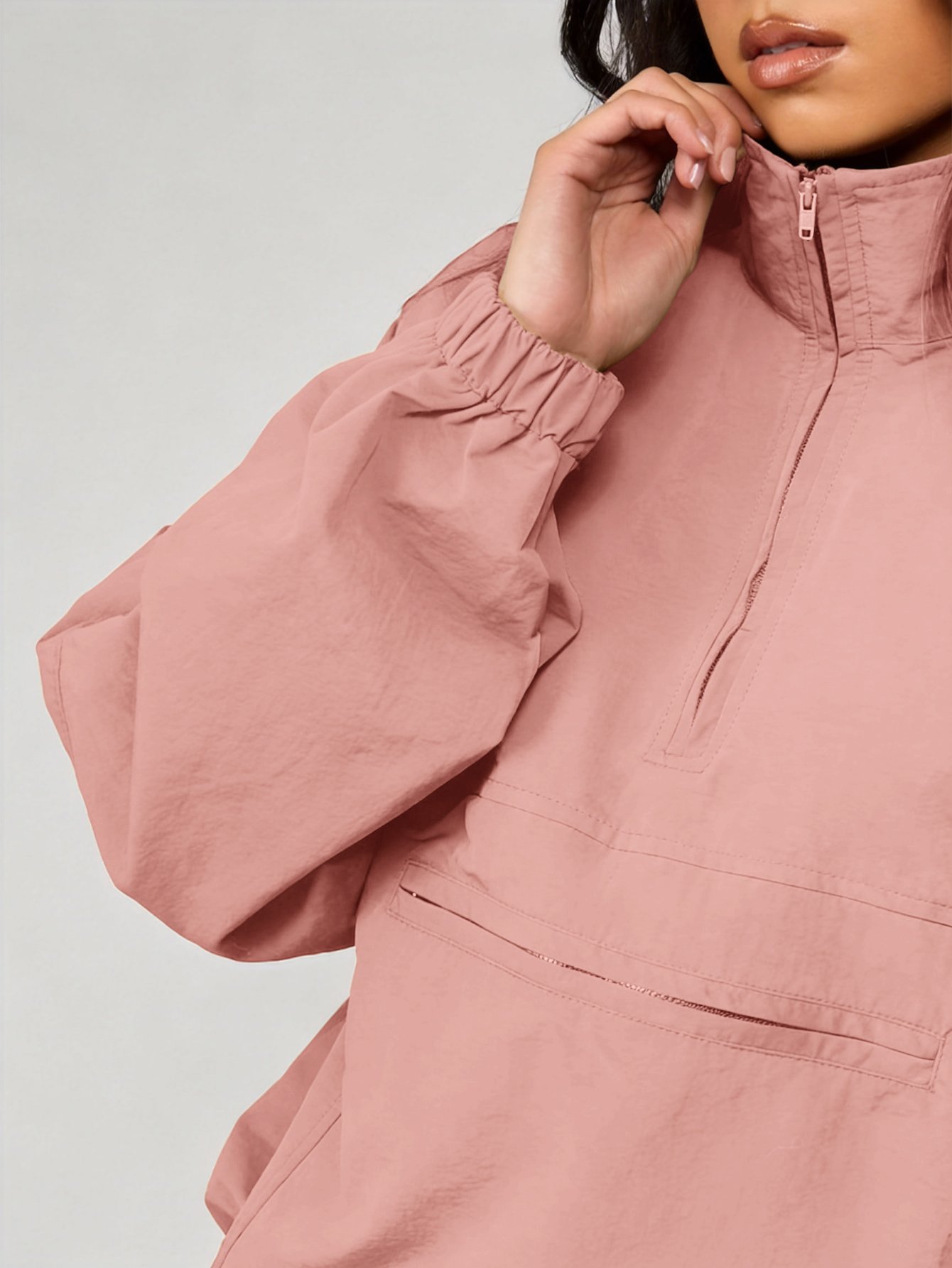 Oversized half-zip high neck windbreaker