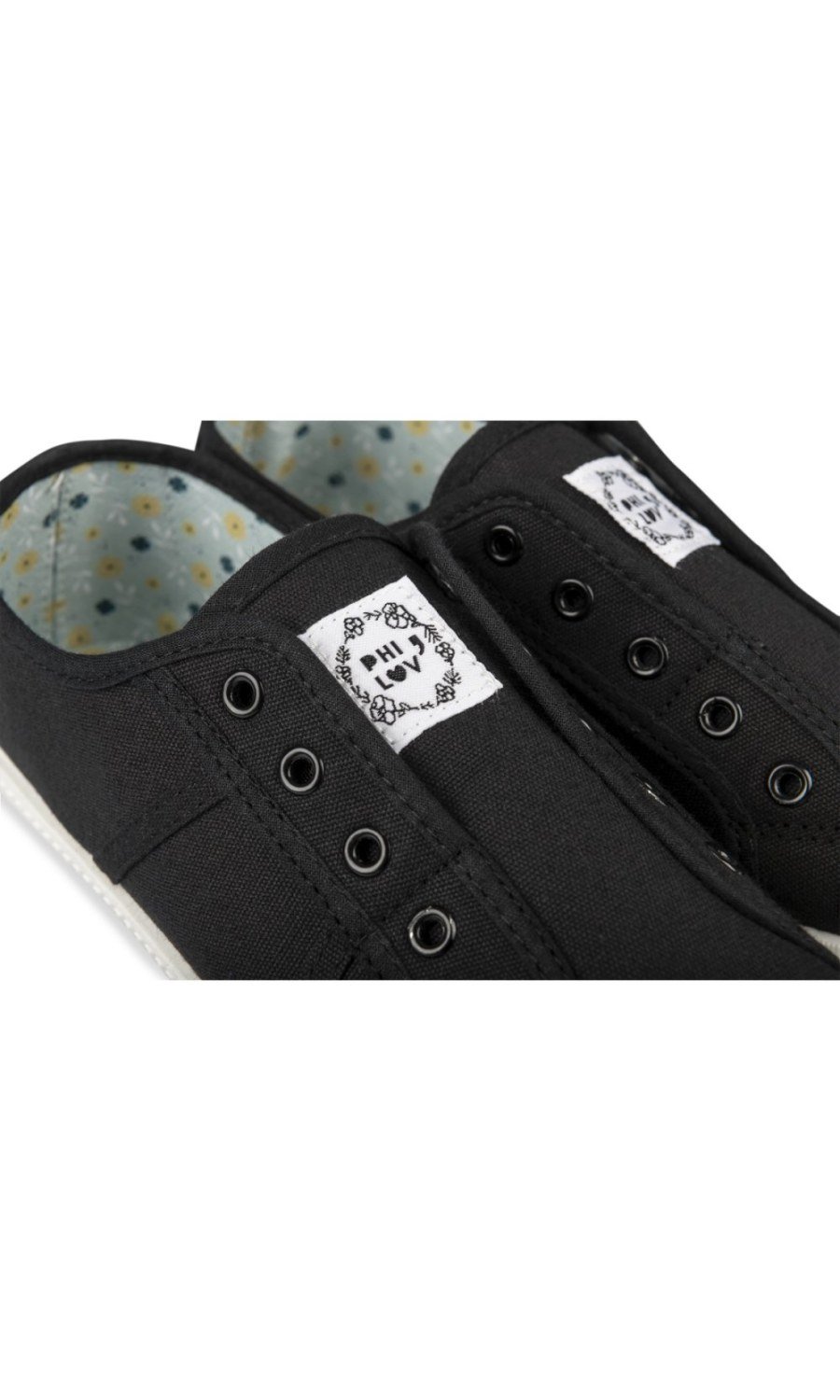 Baskets sans lacets à bout blanc noires
