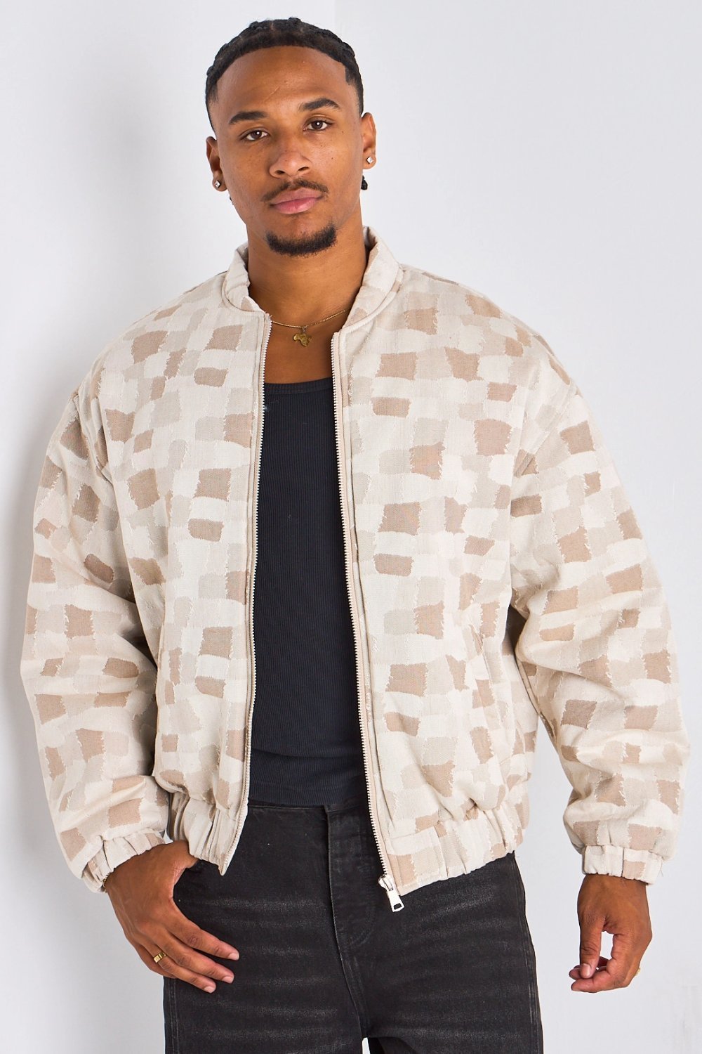 Beige bomber jacket with geometric print