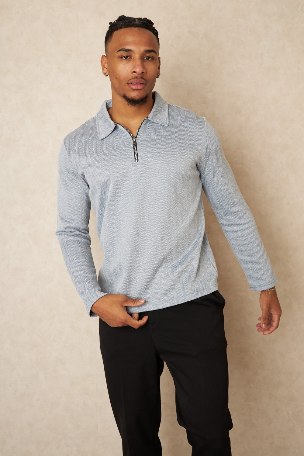 Blue chevron zip-neck jumper