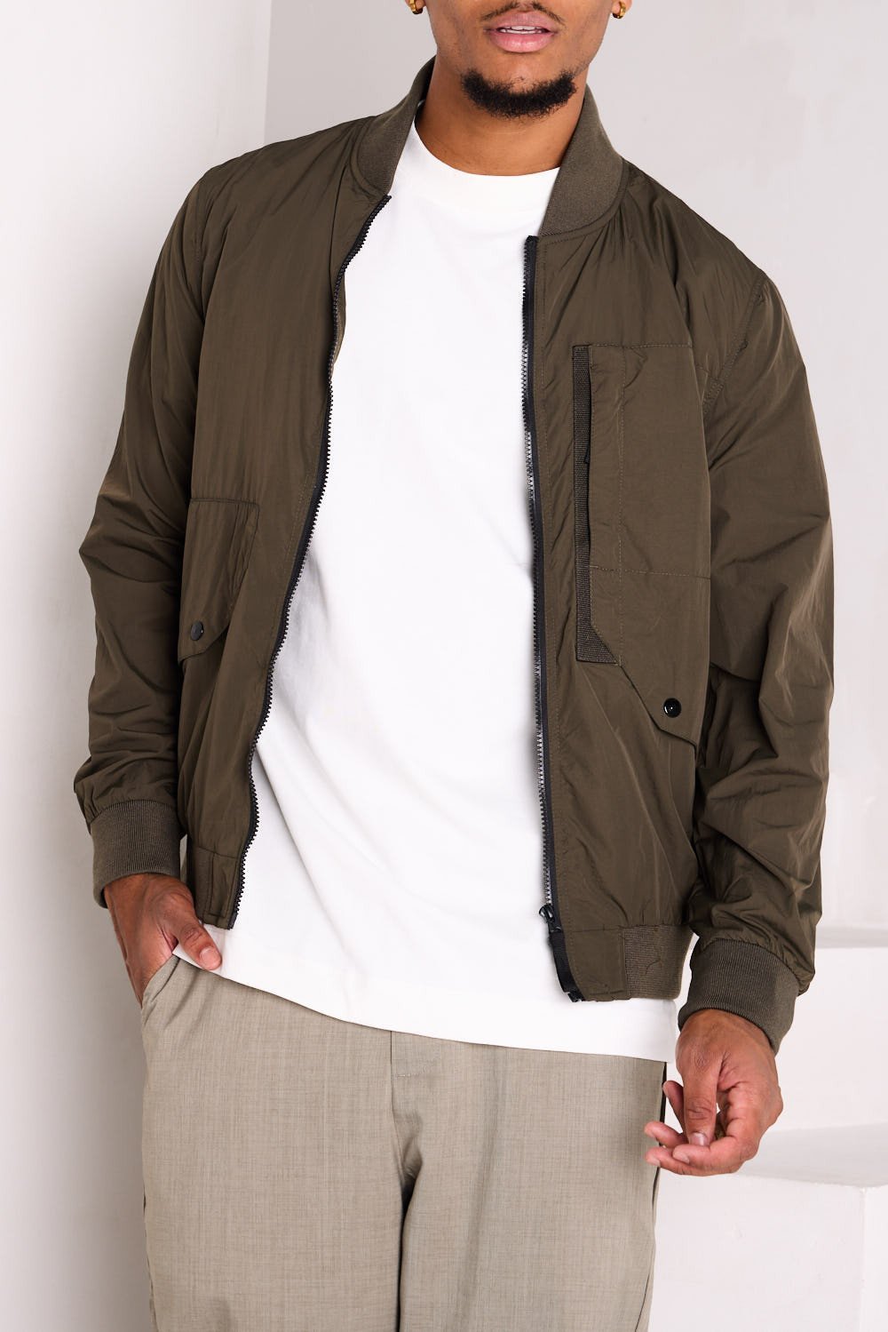 Khaki transitional jacket with high collar