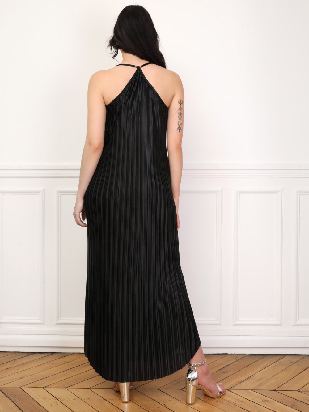 Black satin pleated dress with curved hem