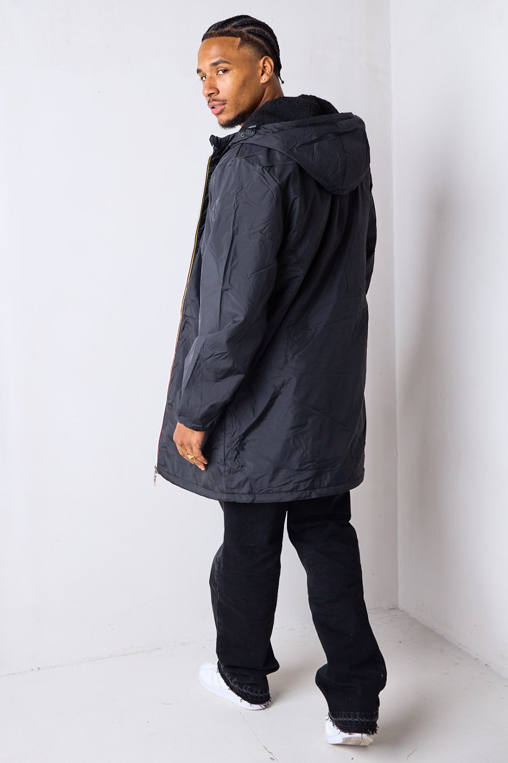 Black fleece jacket with multicoloured stripes