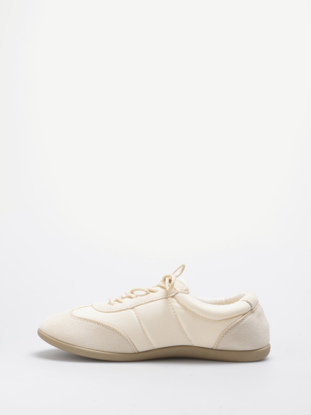 Beige quilted and faux suede trainers