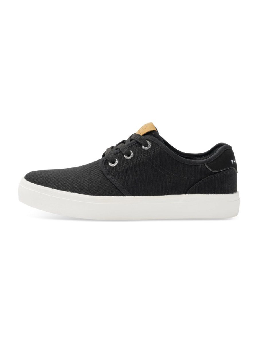 Black canvas trainers with white sole