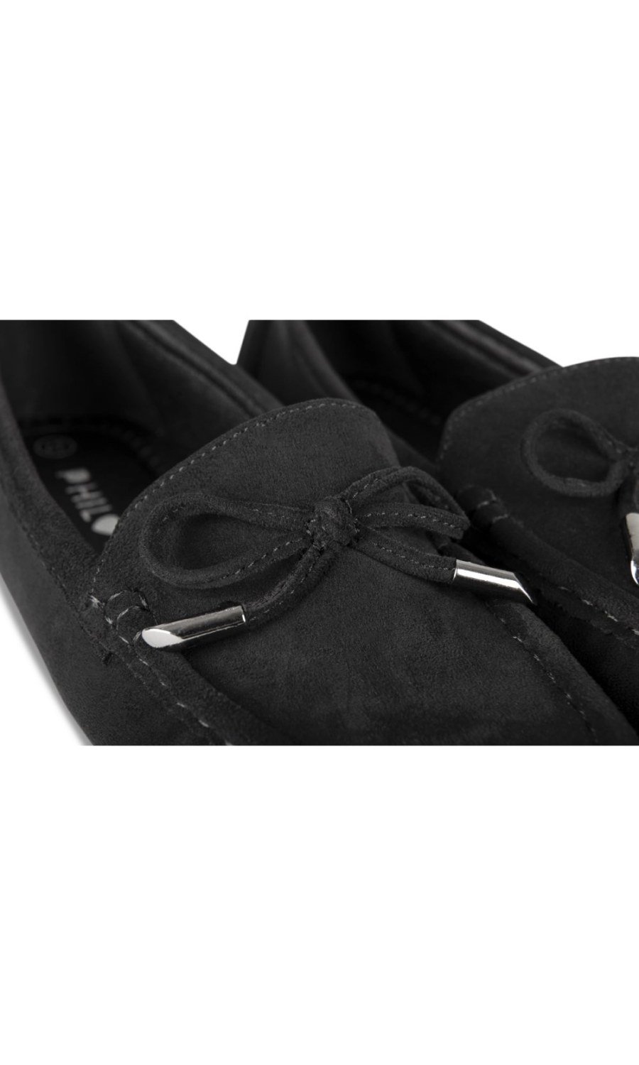 Black faux suede moccasins, bow and eyelets