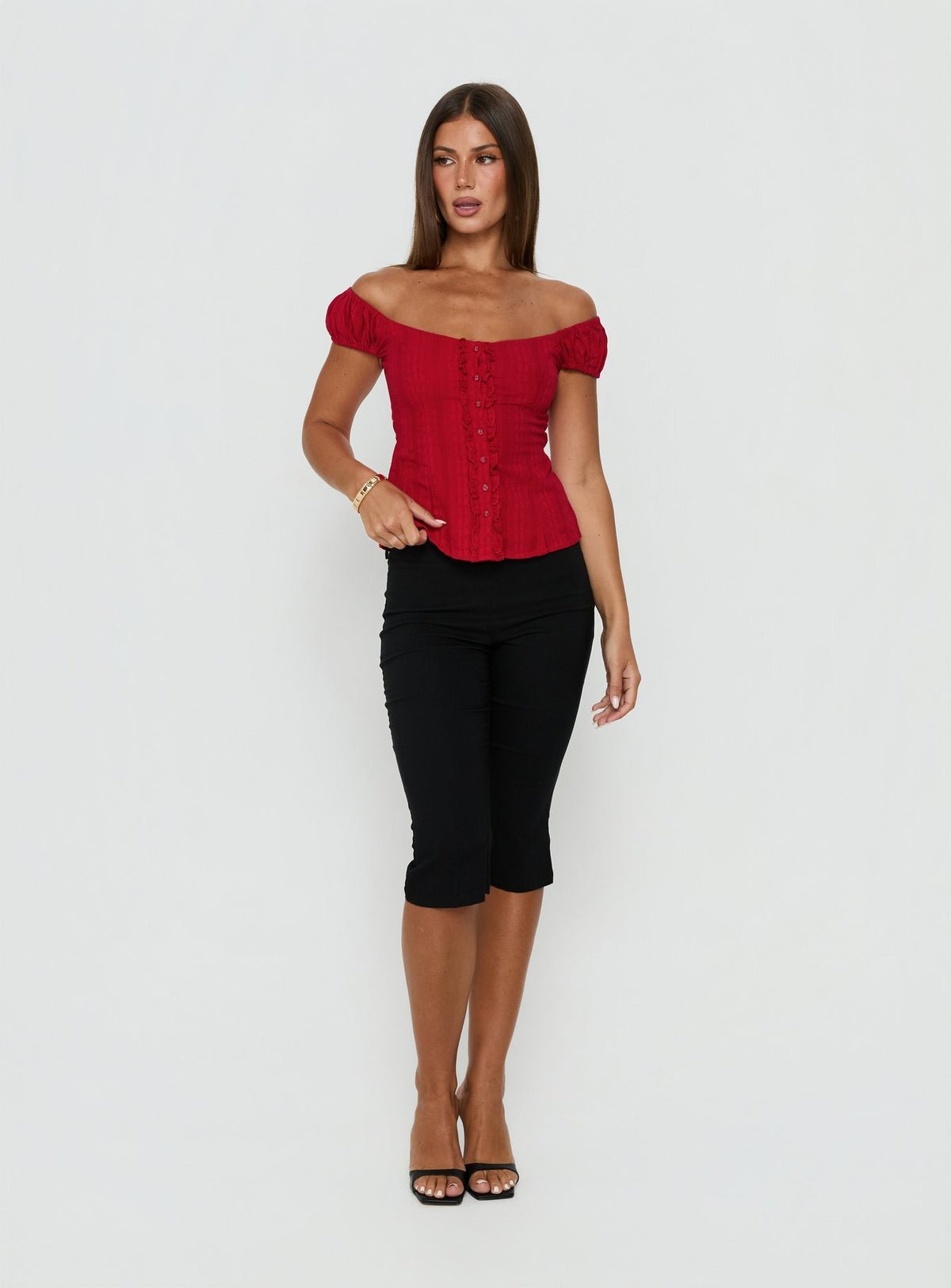 Off-shoulder button-up frill top