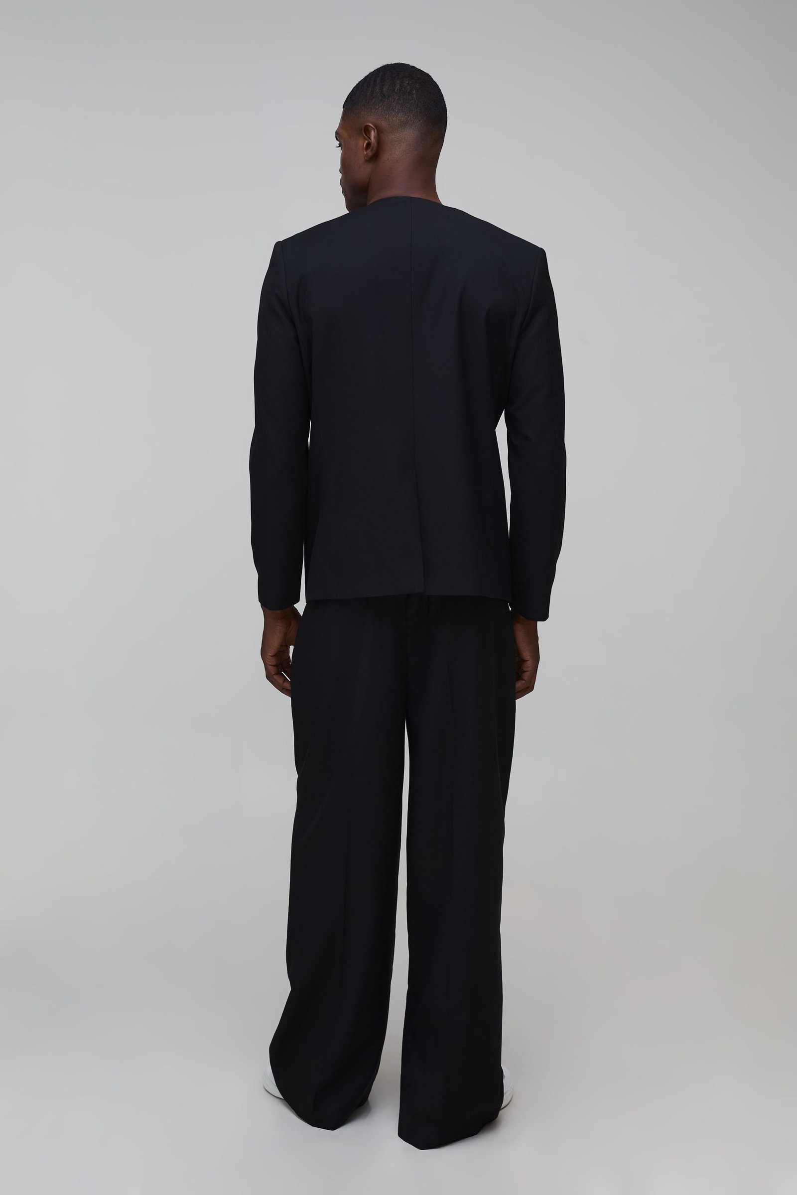 Collarless double breasted suit jacket
