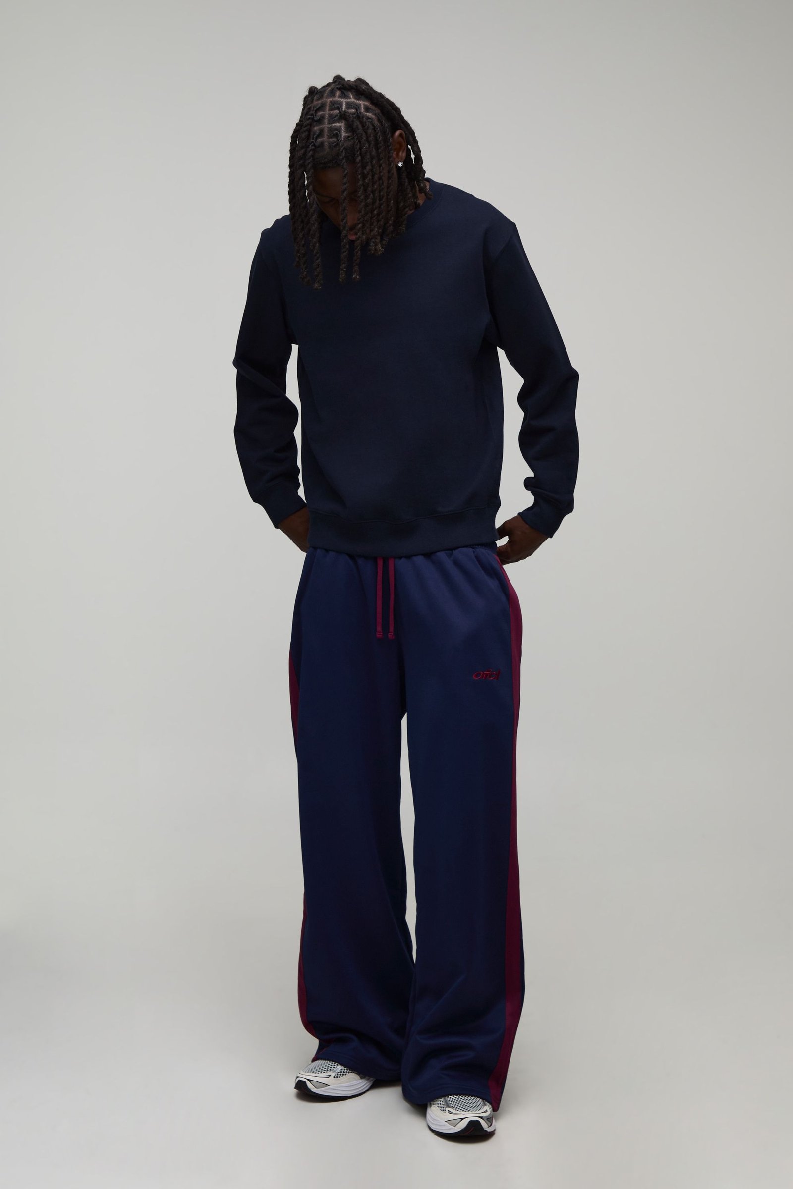 Jogger en tricot brodé à jambe large