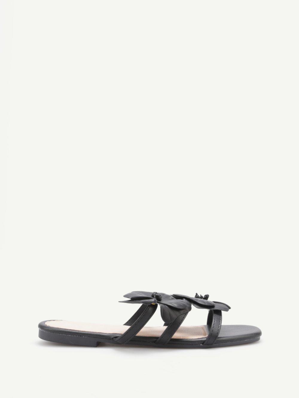 Black flat faux leather mules with raised flowers
