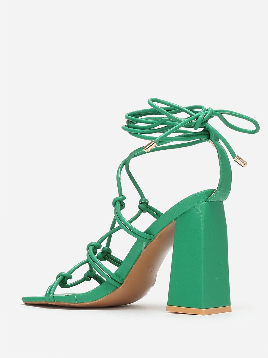 Green block heel sandals with lace-up calf straps