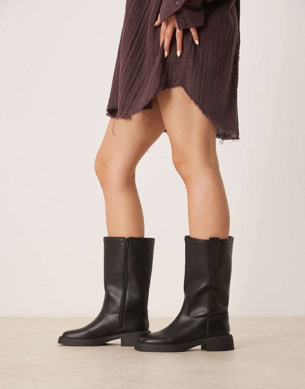 Flat knee high biker boots in black