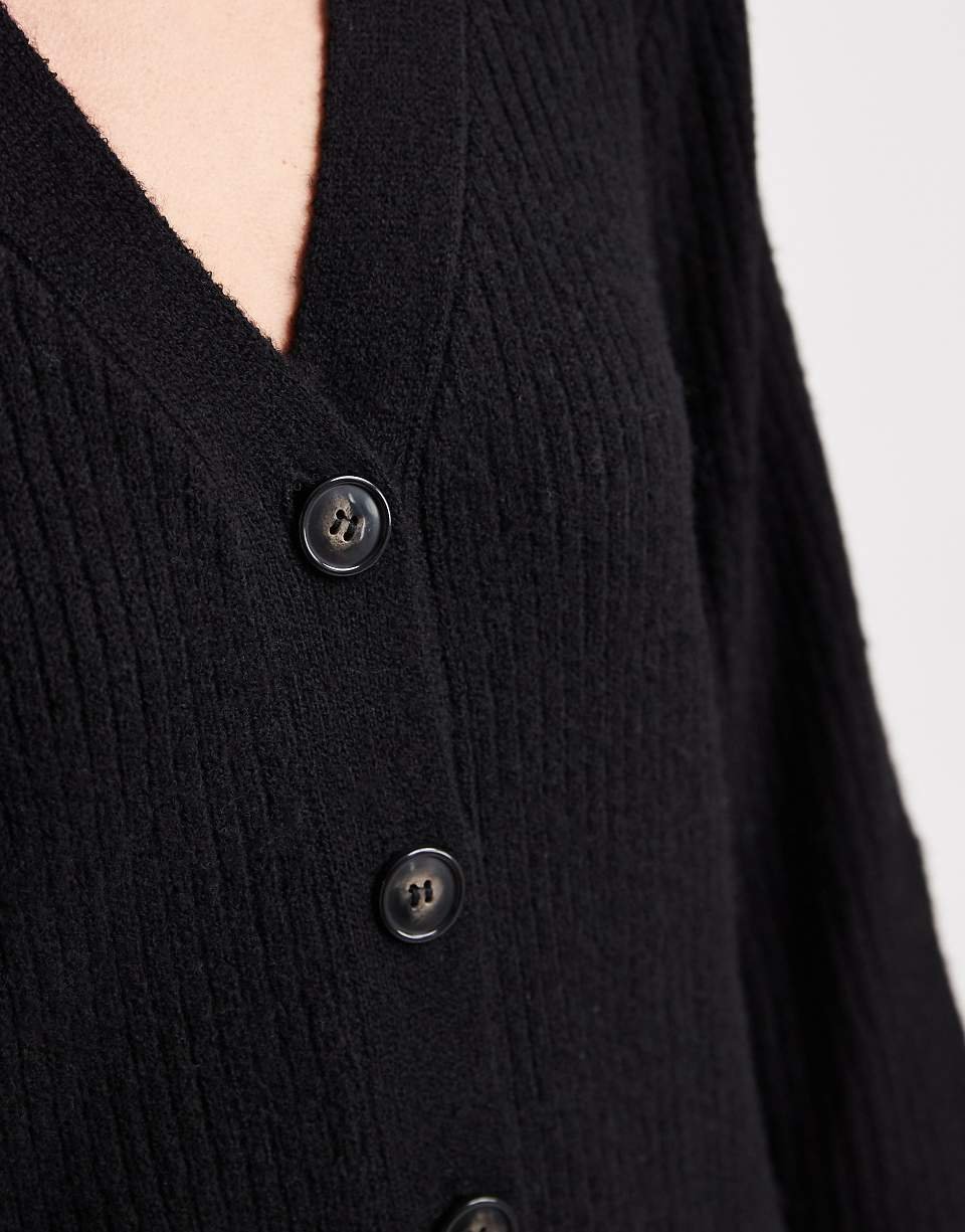 Robe courte en maille boutonnée à manches ballon