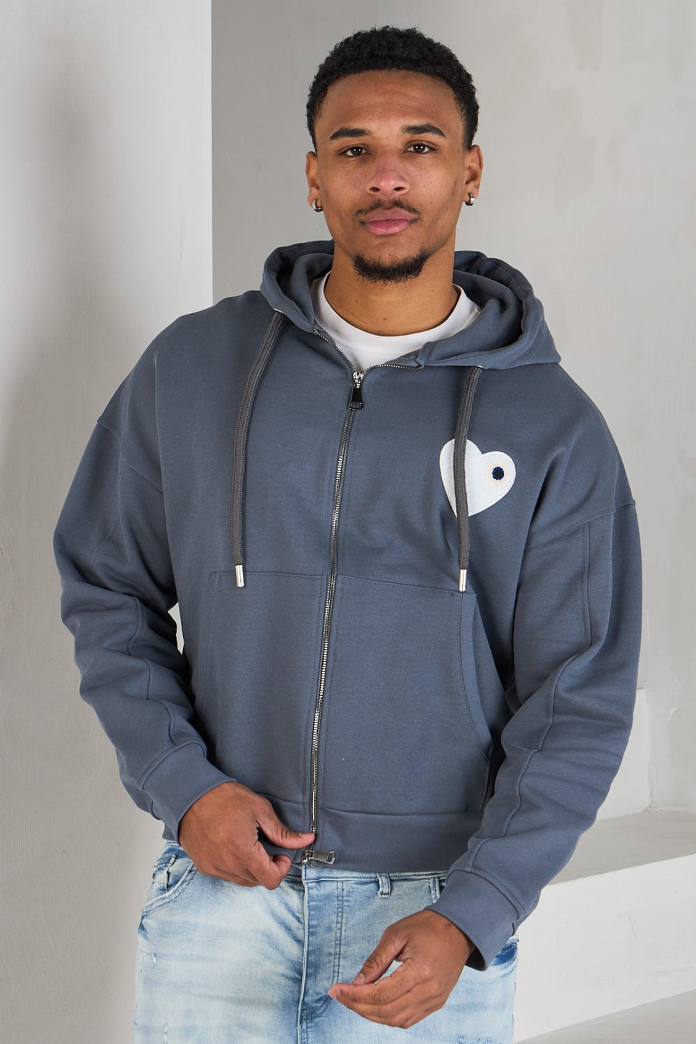 Grey zip-up hoodie with embroidered heart