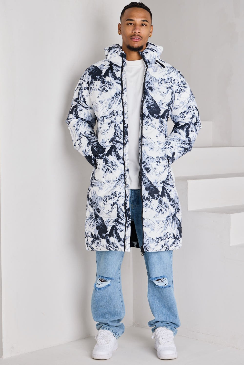 Grey longline puffer with mountain print