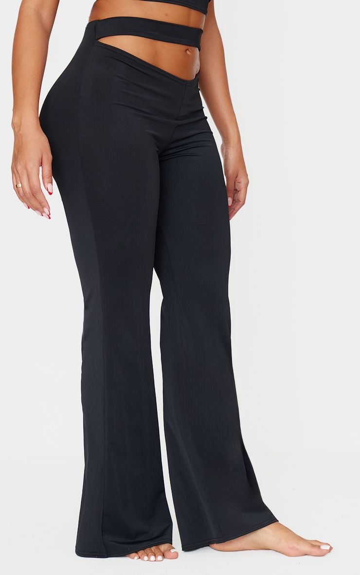 Sculpt cut out waist flared trousers