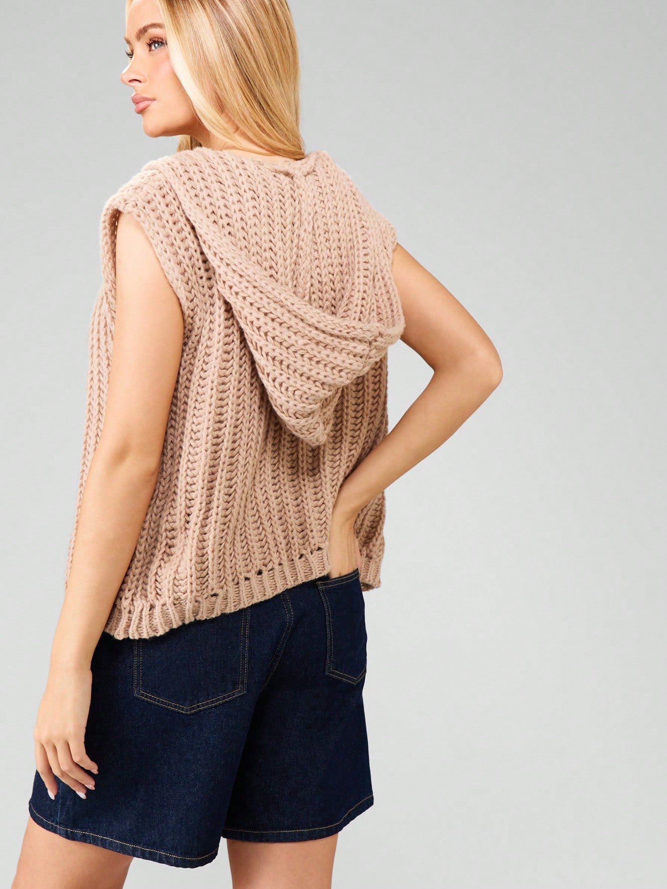 Cardigan ouvert sans manches en tricot à capuche