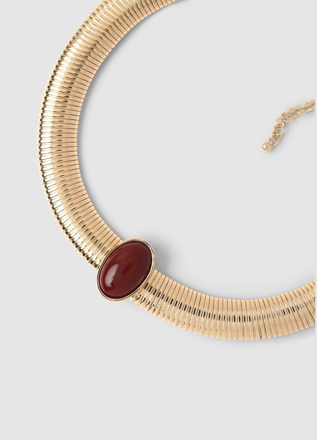 Collier ras du cou rigide à pierre ovale