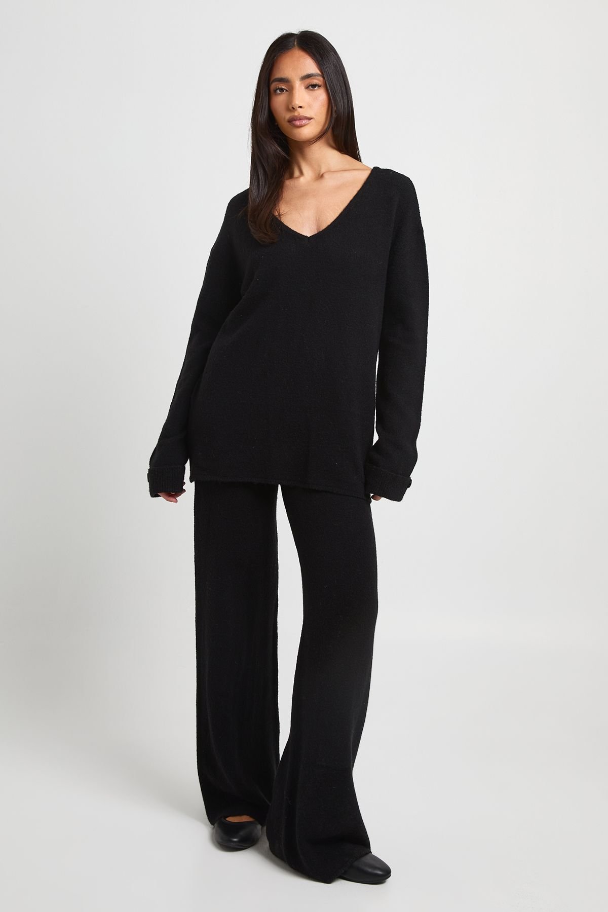 Ensemble coordonné pull col v à poignets boutonnés