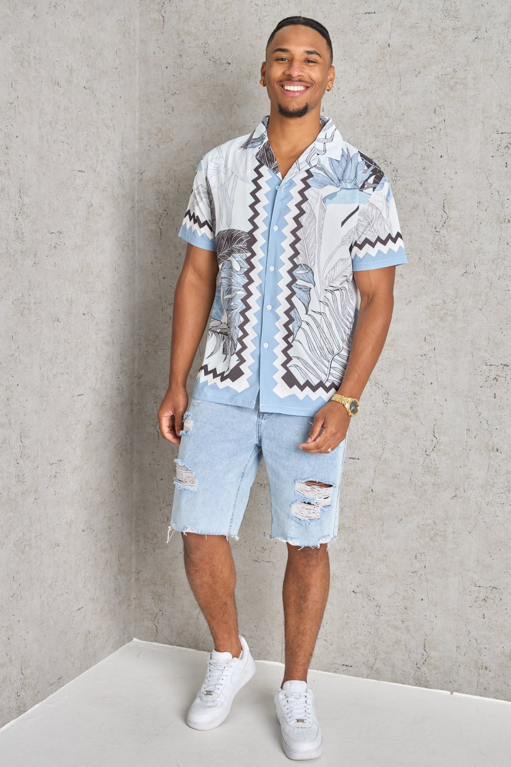 Blue floral and geometric print shirt
