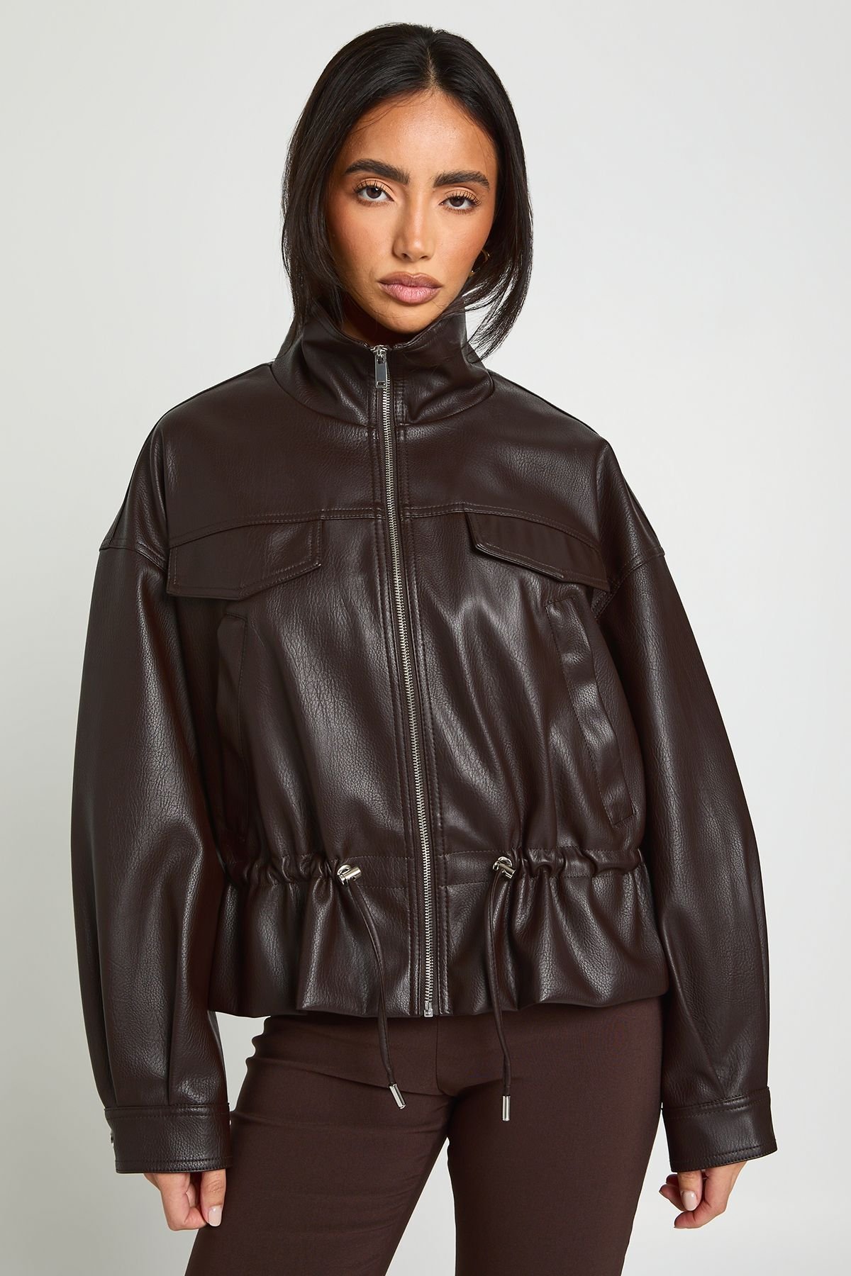 Veste b similicuir b col montant w khsar mchdoud