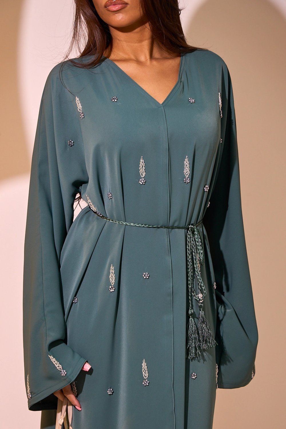 Dark green abaya with ear and floral rhinestones