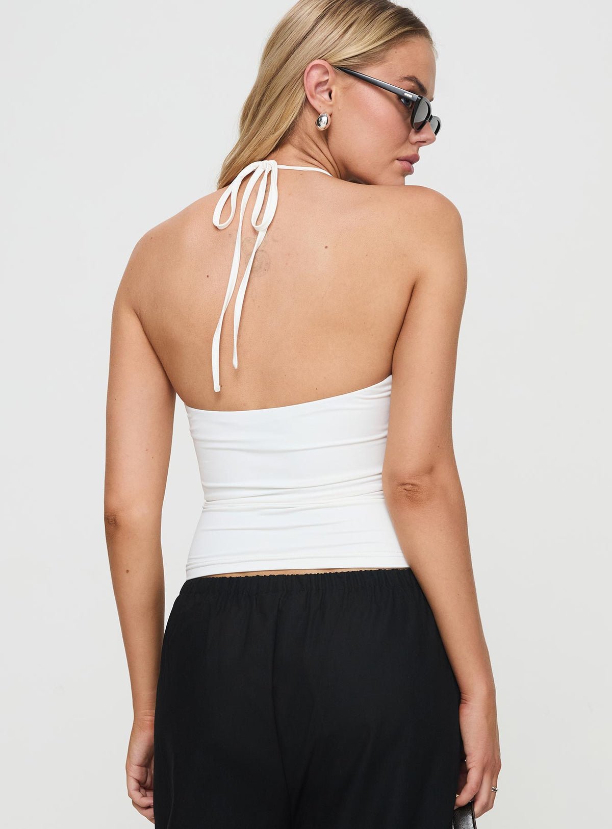 Cropped halter top with low back