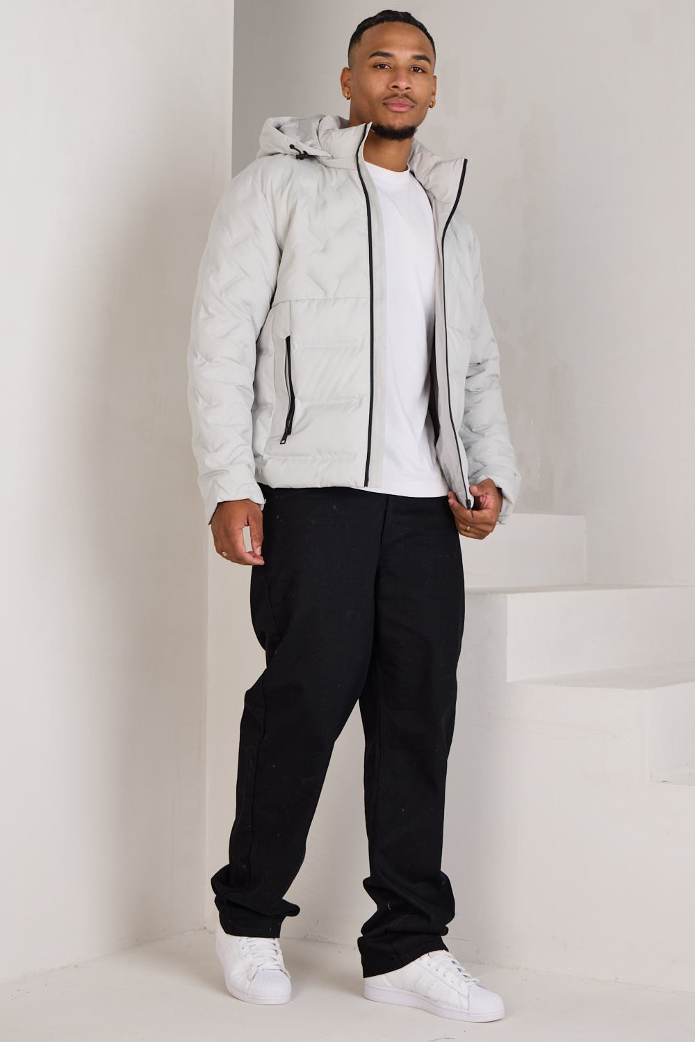 Grey chevron-quilted hooded puffer jacket