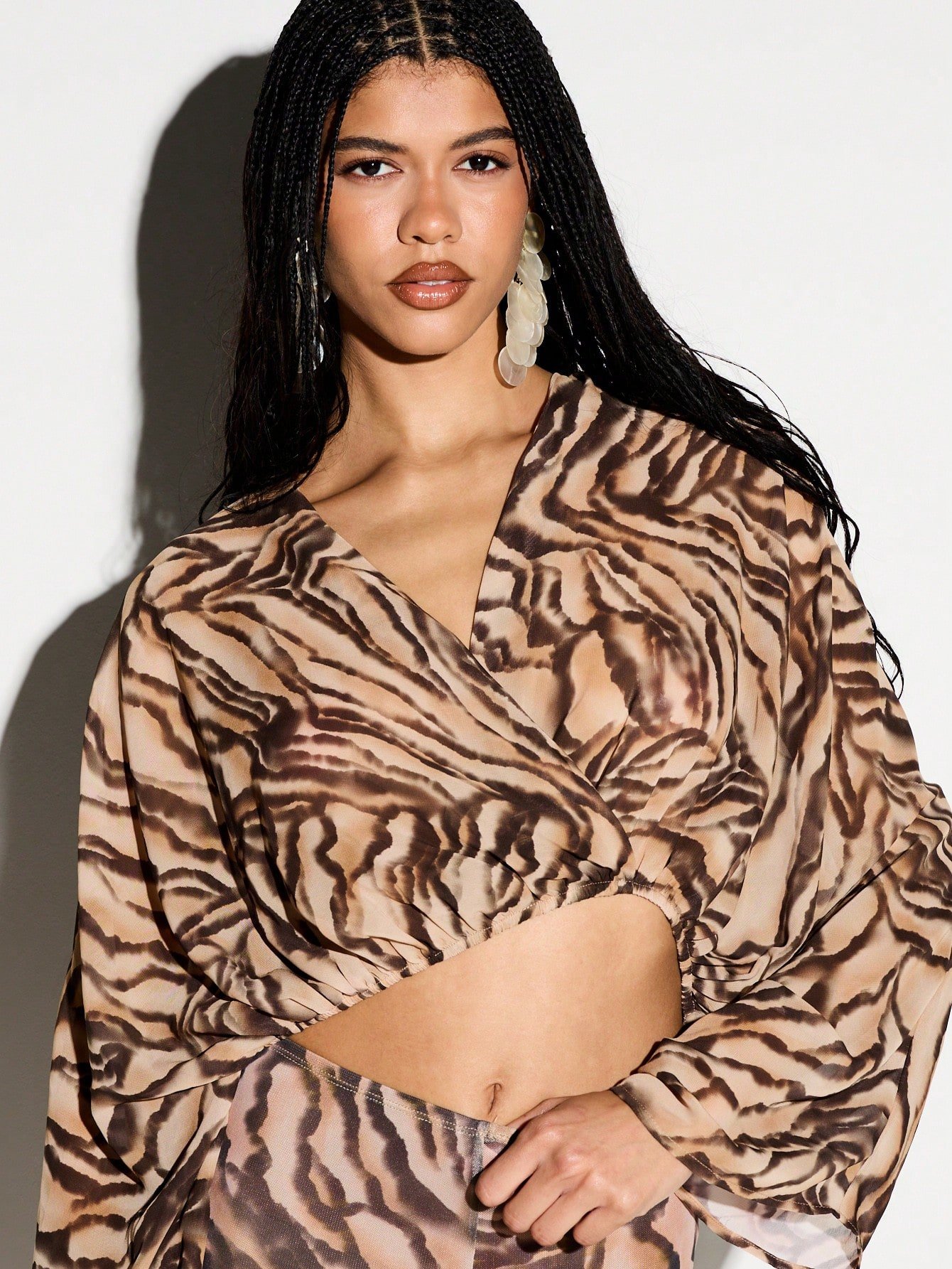 Blouse imprimé tigre à manches chauve-souris
