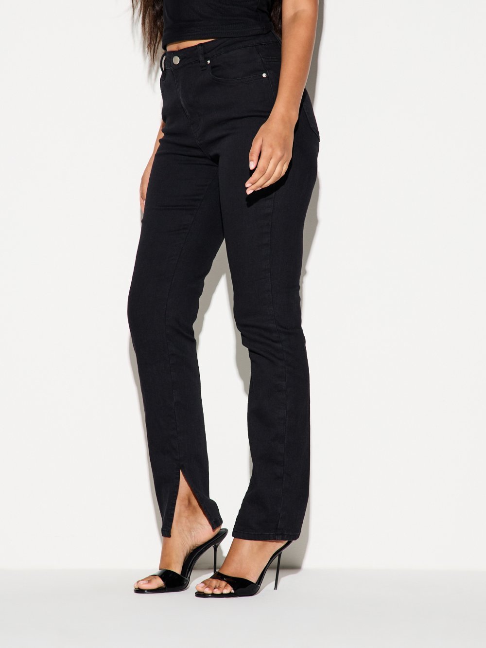 Jean skinny taille haute à ourlet fendu noir