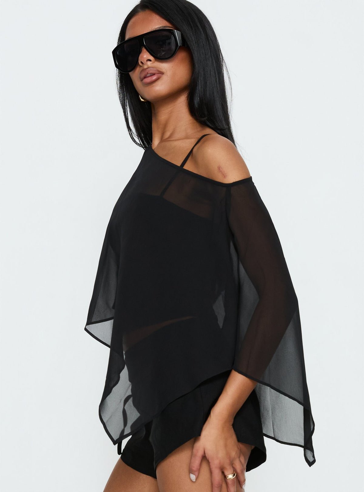 Asymmetric chiffon poncho top