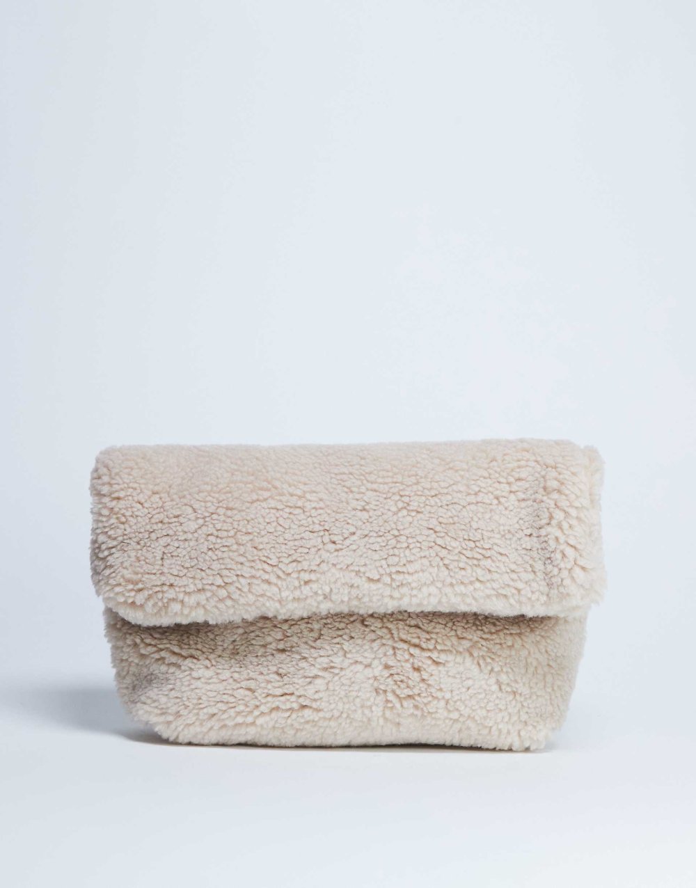Beige faux shearling flap clutch bag
