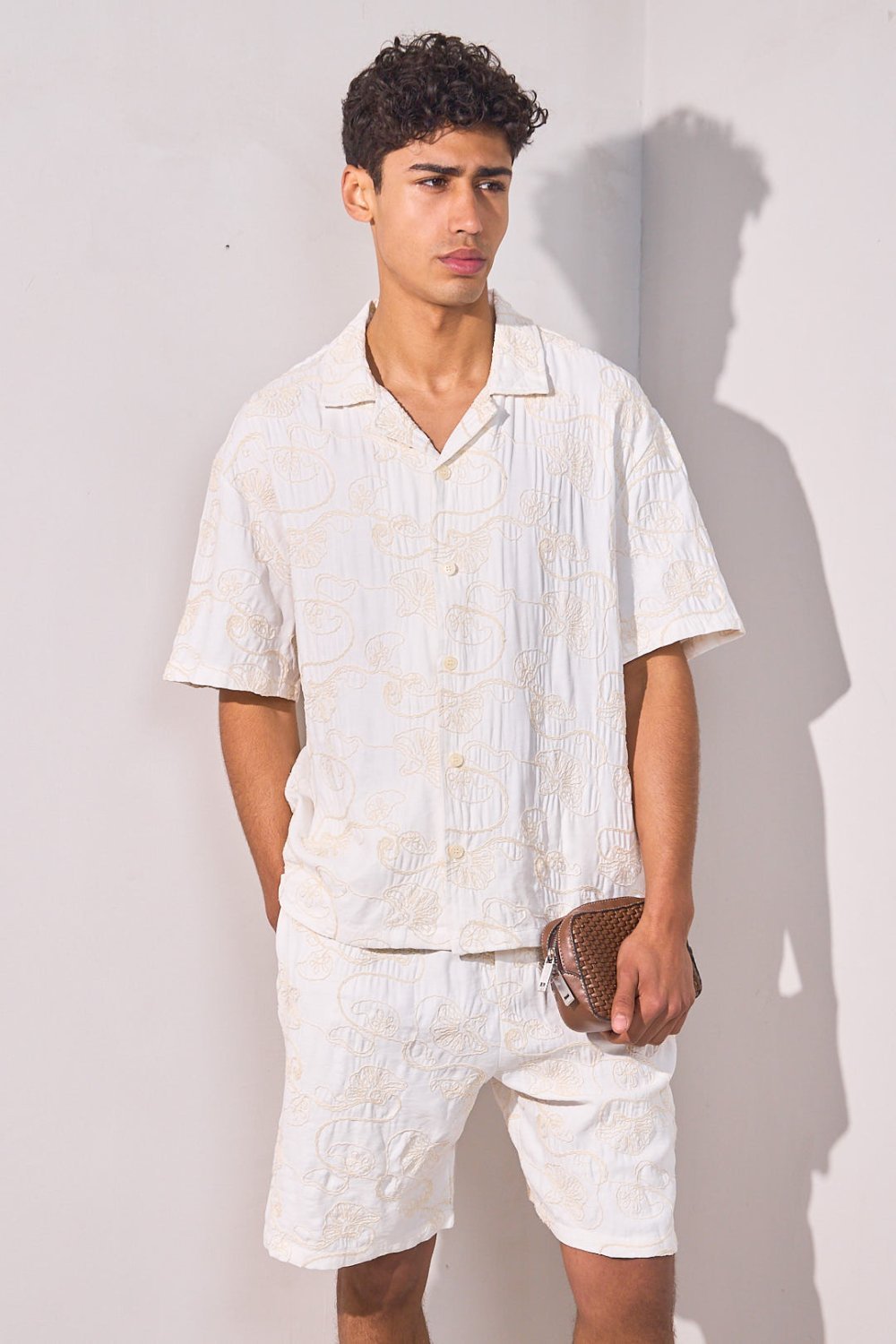 White flower-embroidered shirt and shorts set