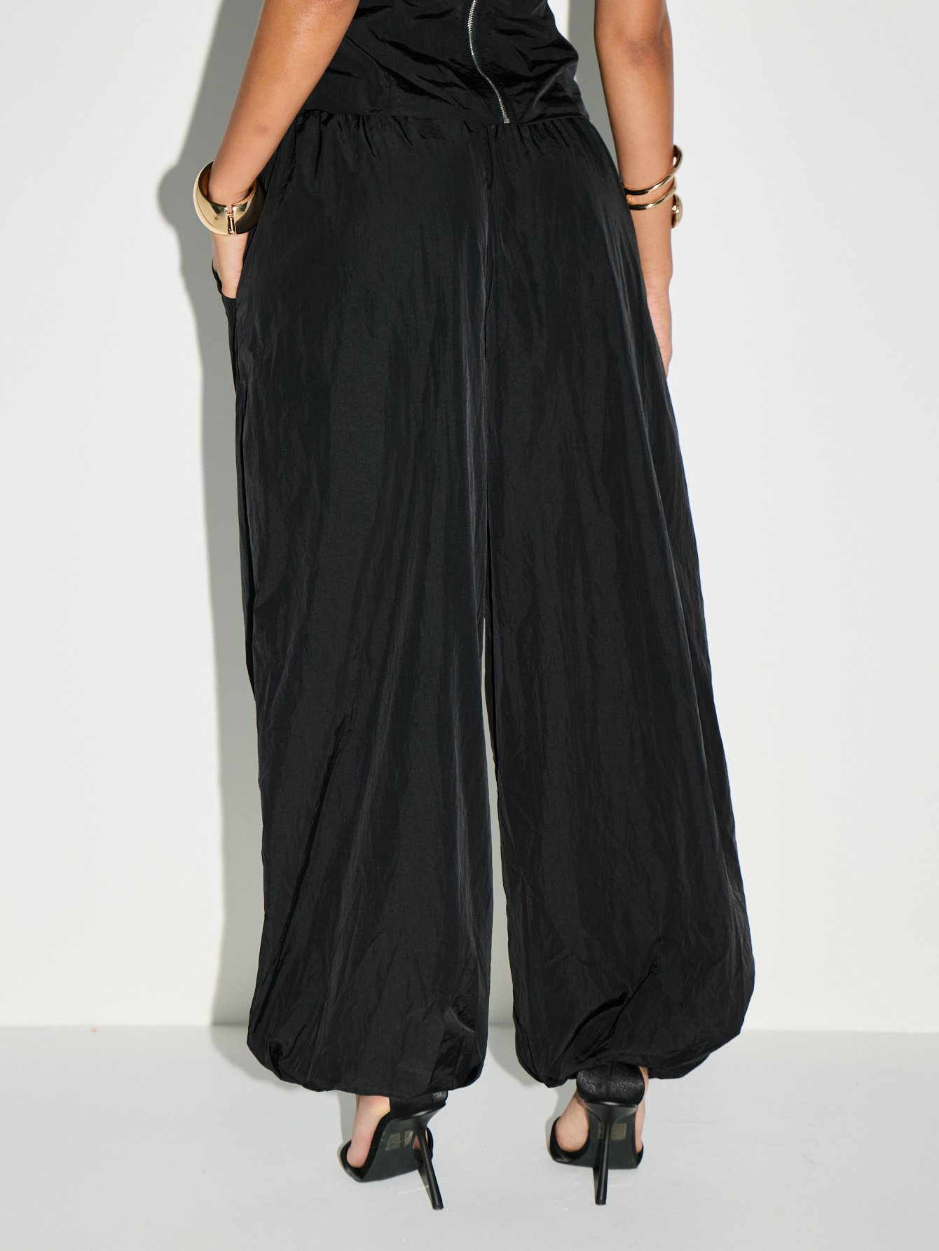 Oversized parachute trousers with gathered ankles