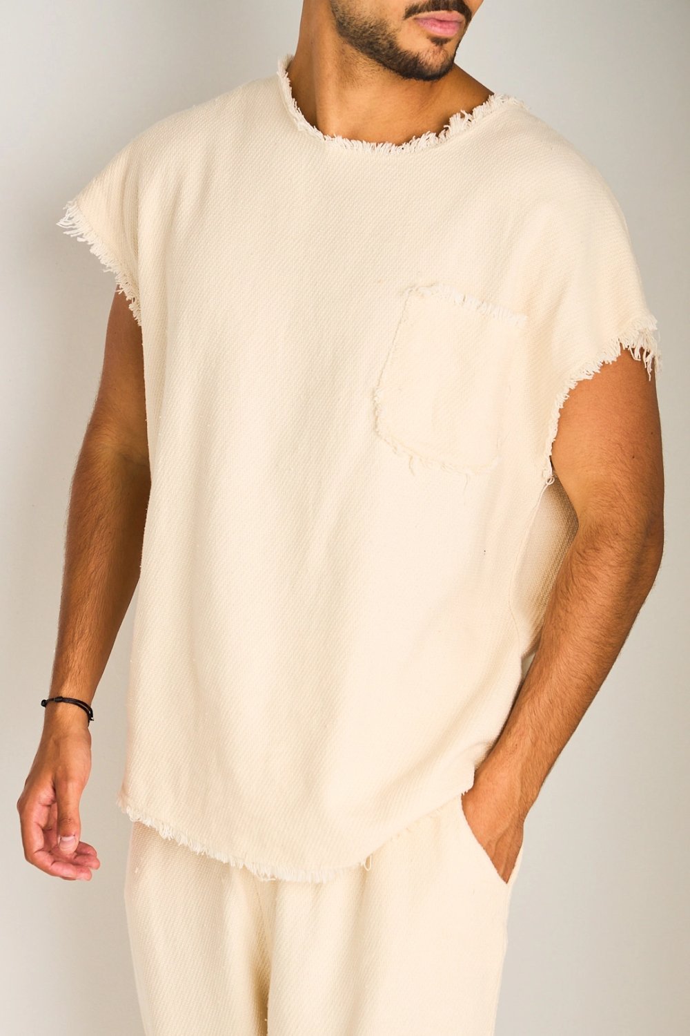 Ensemble débardeur et pantalon effiloché beige