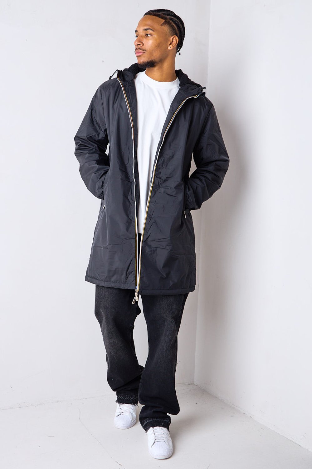 Black fleece jacket with multicoloured stripes