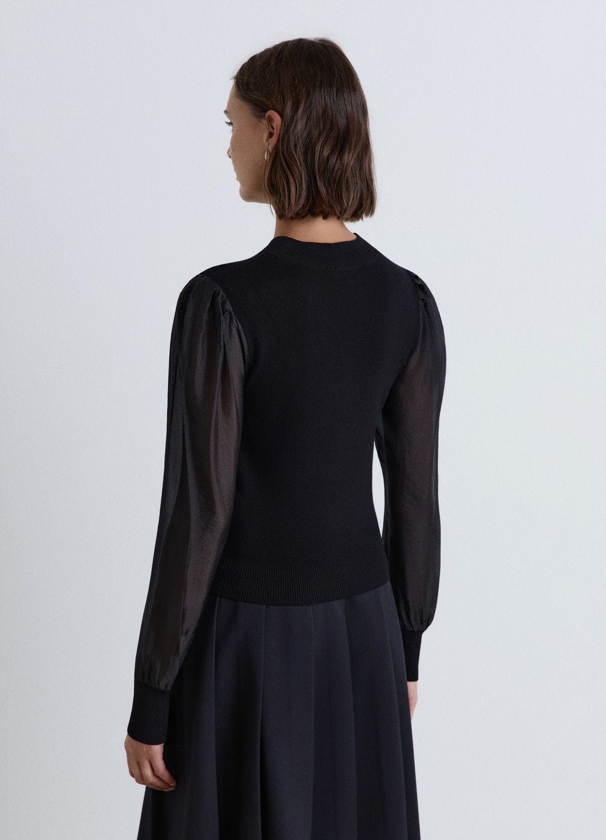 Two-tone top with organza-effect sleeves