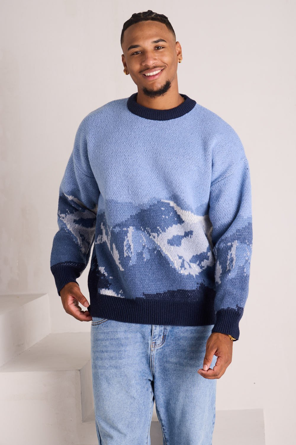Pull en maille texturée bleu, gris et blanc