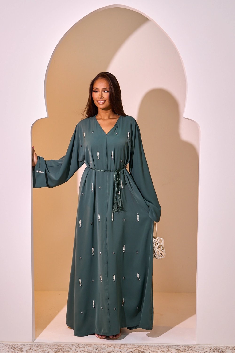 Dark green abaya with ear and floral rhinestones