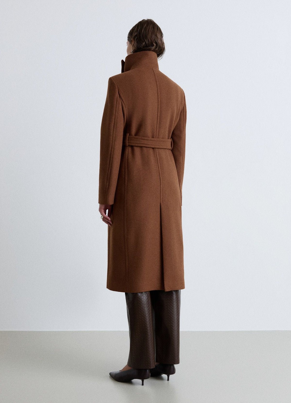 Long high-neck belted coat