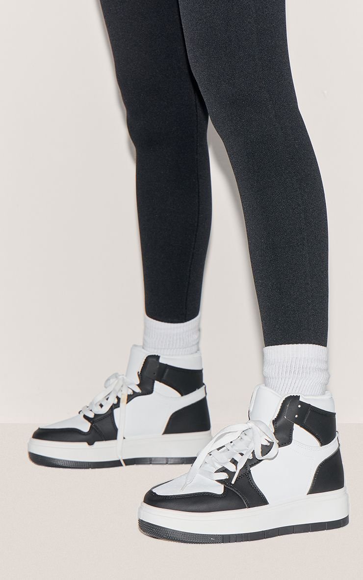 Black and white high-top platform trainers