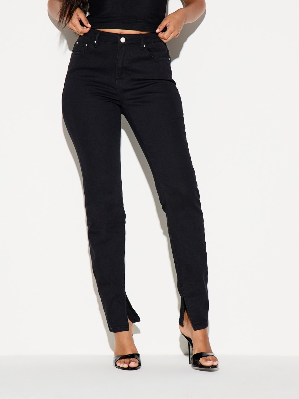 Jean skinny taille haute à ourlet fendu noir