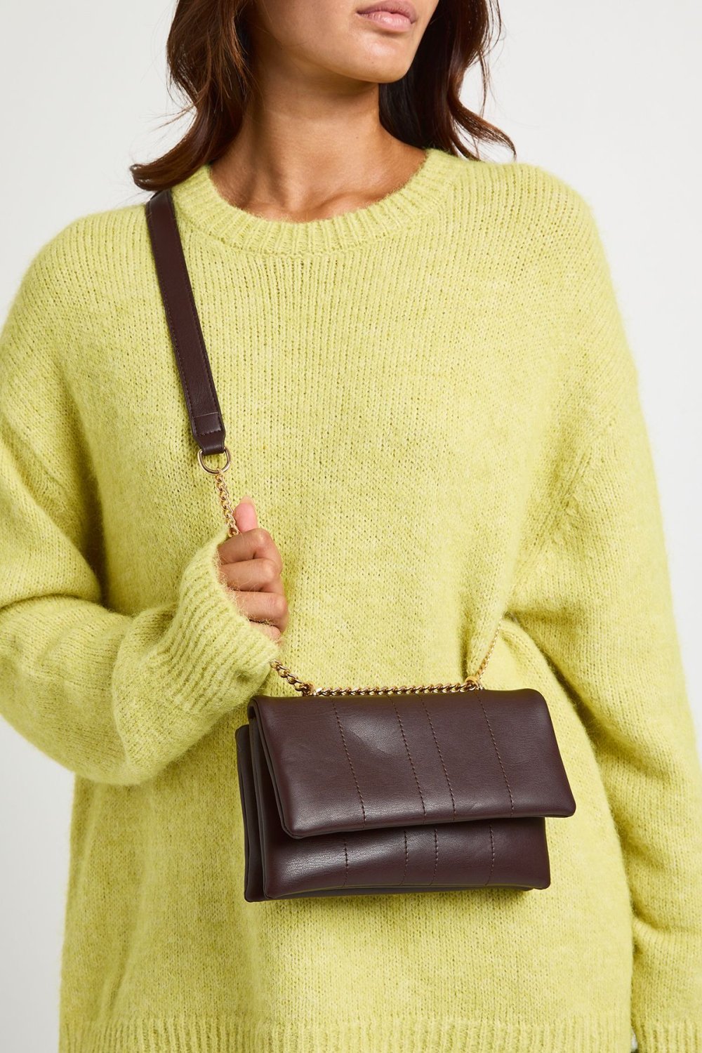 Quilted cross-body bag with fold-over flap