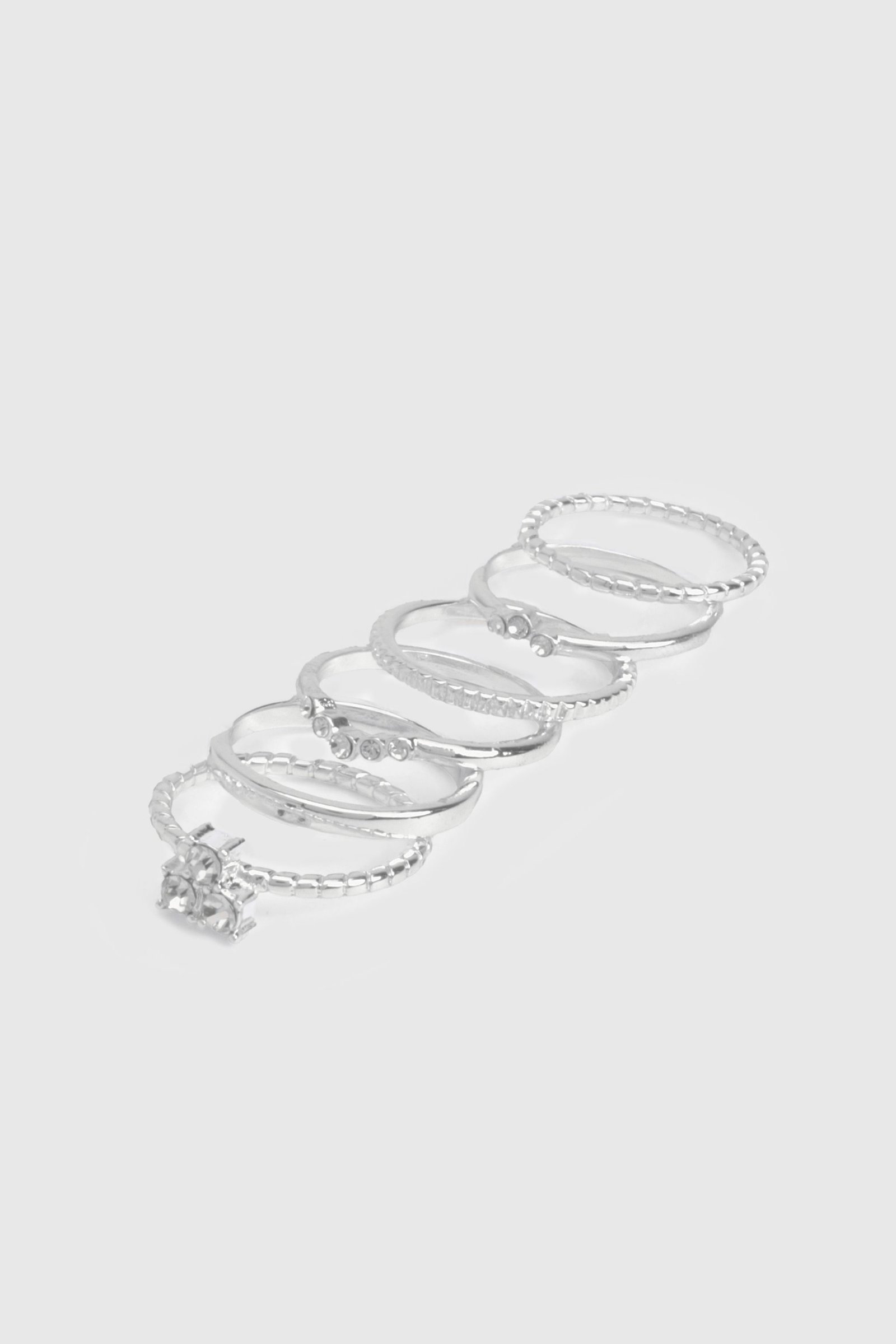 Lot de 6 bagues argentées à strass