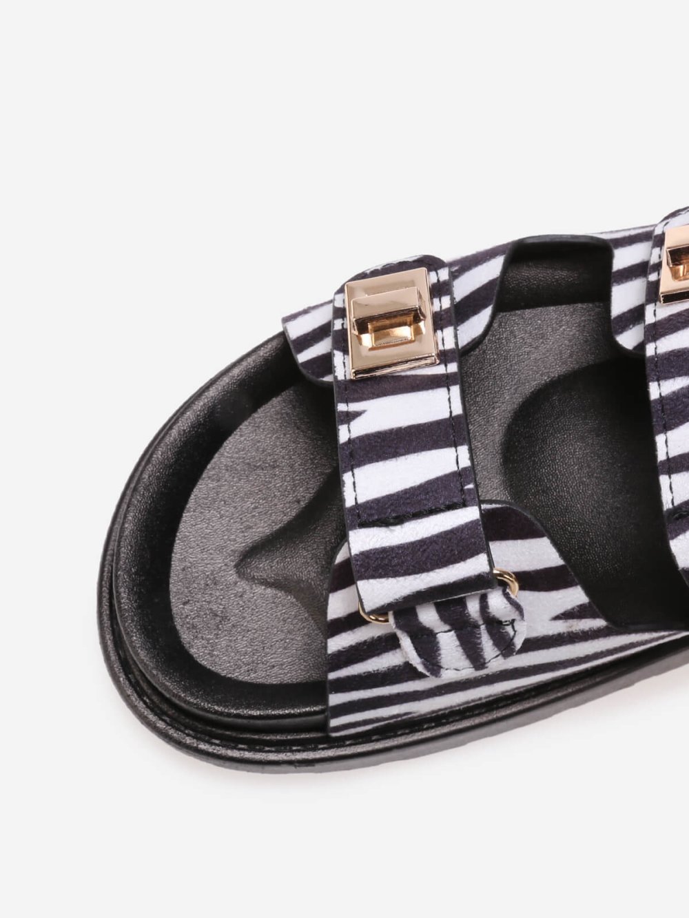 Black and white platform mules with straps