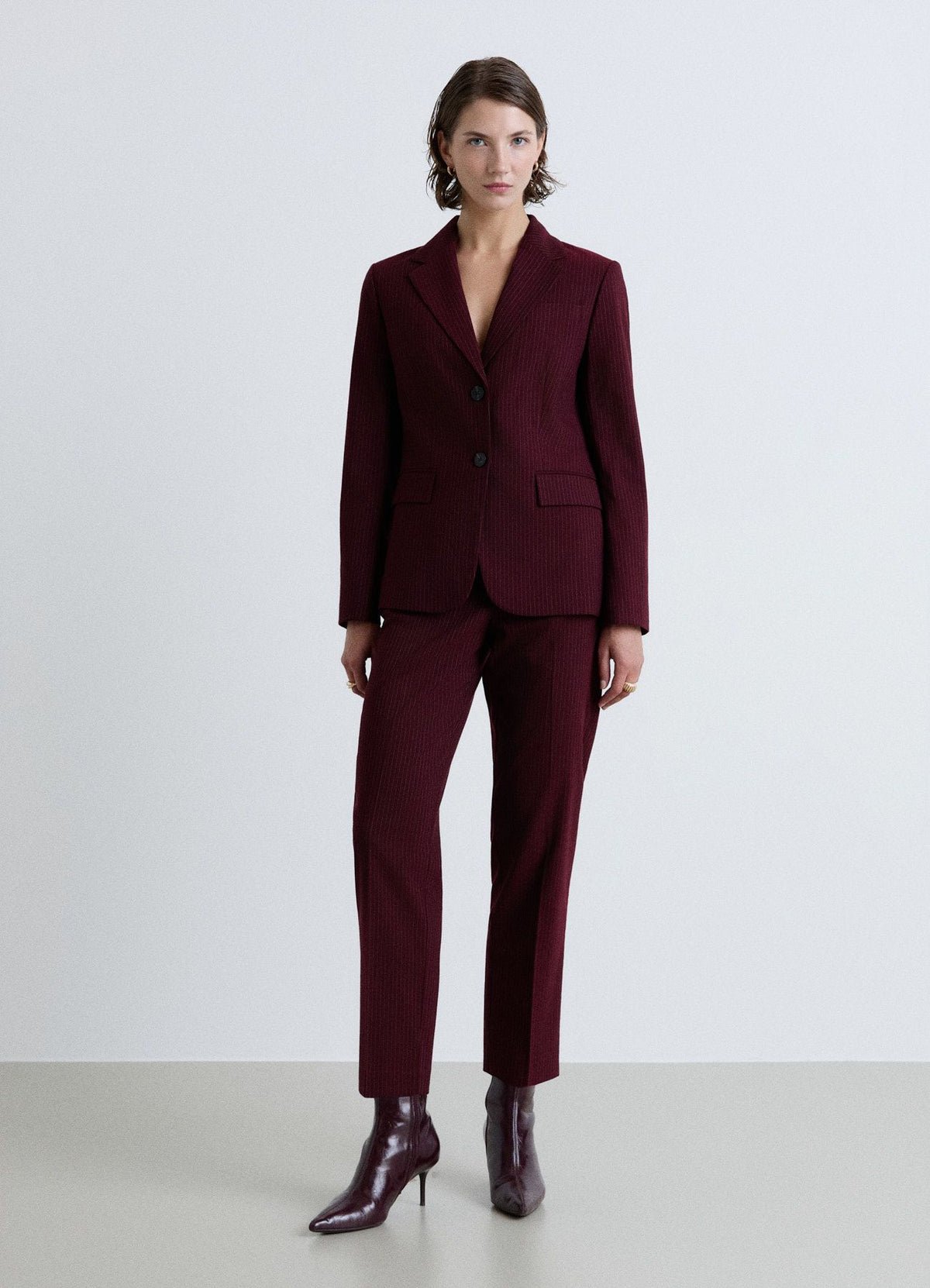 Blazer mkhetet b jouj boutons