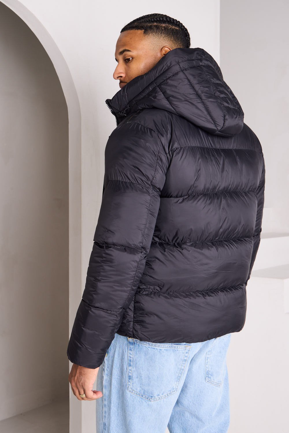 Black quilted hooded puffer jacket