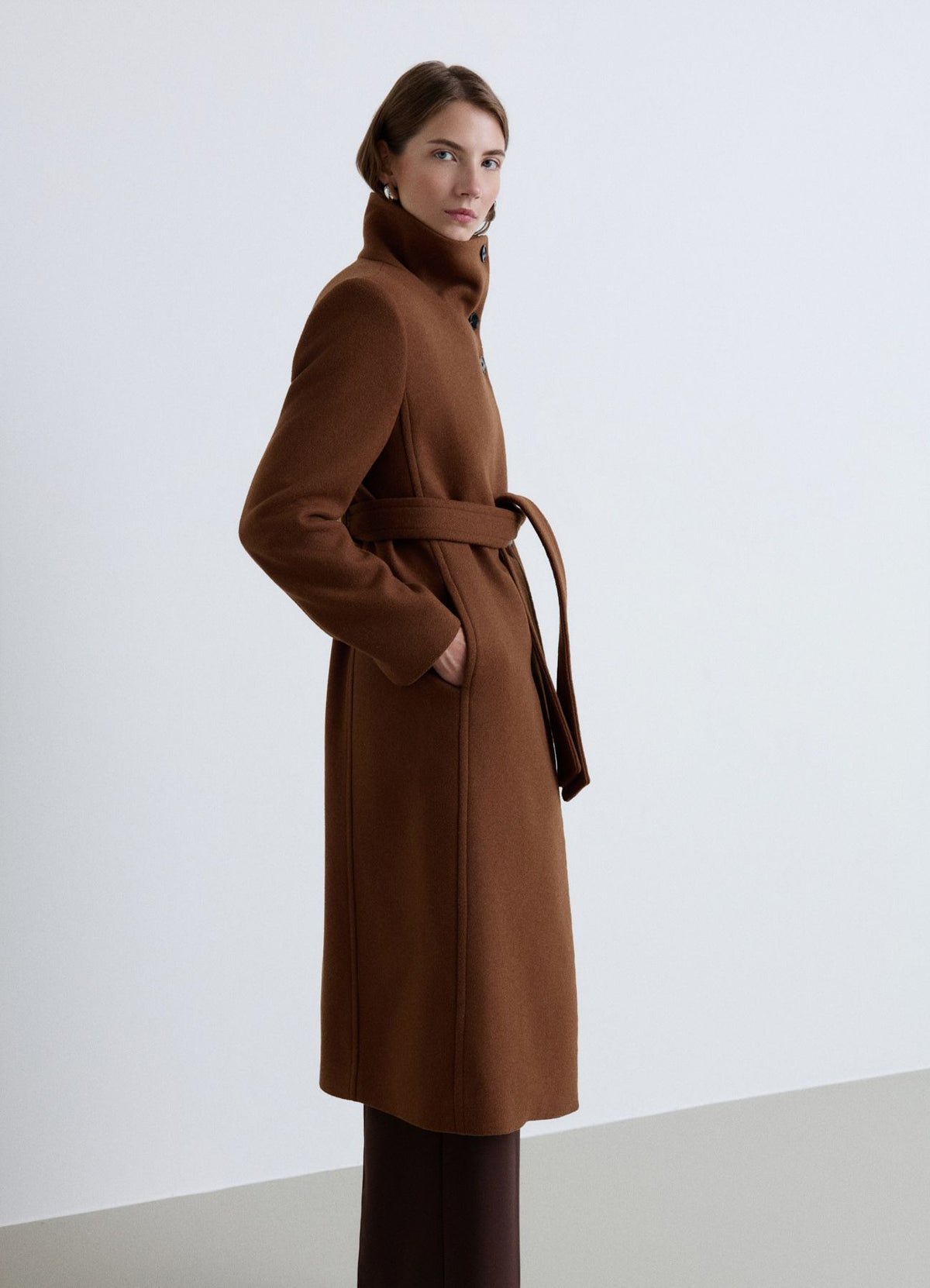 Long funnel-neck belted coat